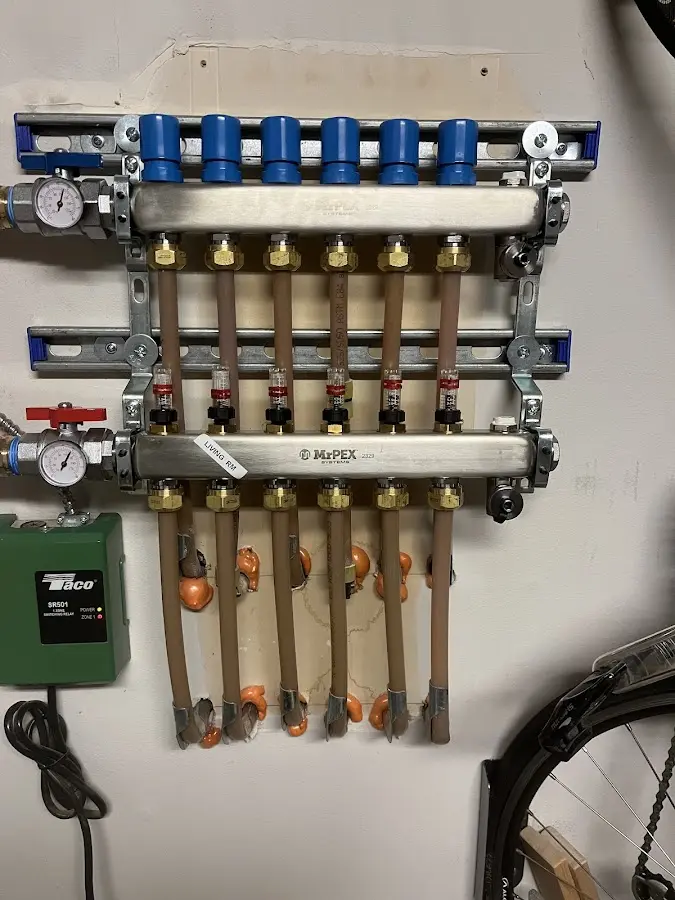 Plumber performing Water Heater Repair at a residential property in Floresville